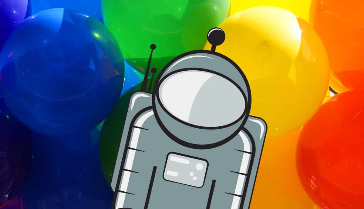 Floaty celebrates a milestone by hanging out with some microgravity balloons.