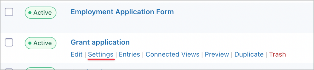 The 'Settings' link that appears when hovering over a form in the list on the Gravity Forms Forms page