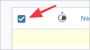 An arrow pointing to the bulk select checkbox on the Gravity Forms Entries page.
