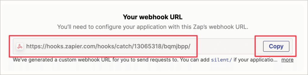 The webhook URL in Zapier; there is a button to copy it