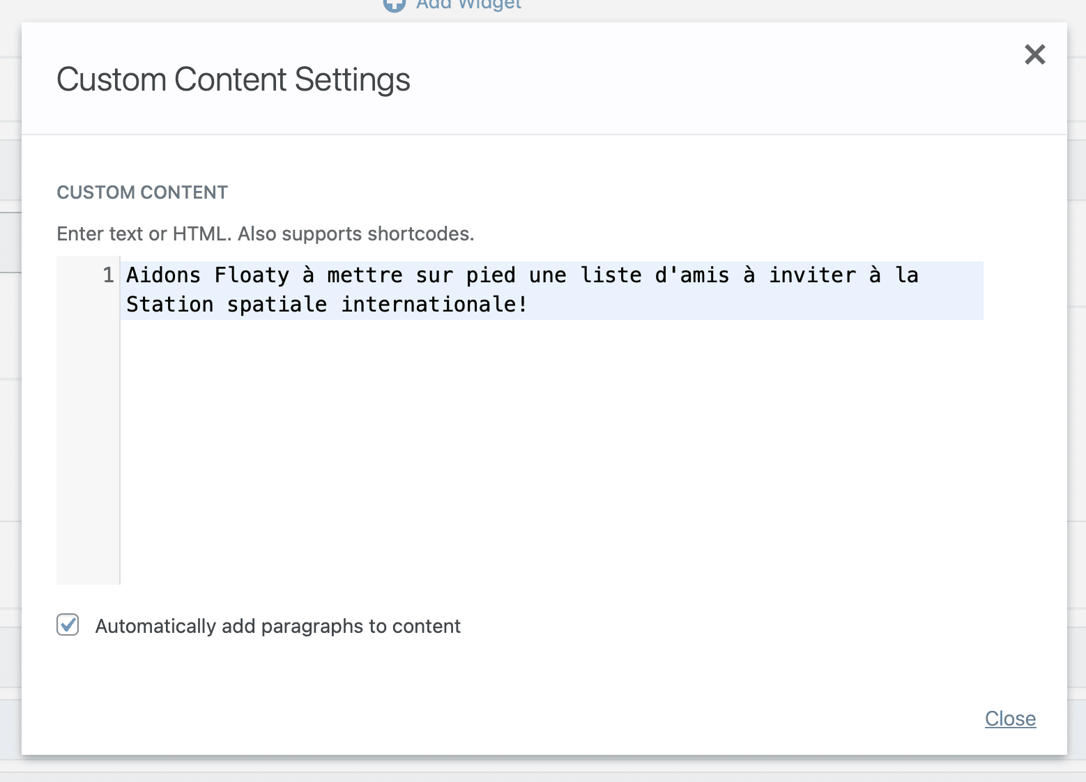 Custom content settings text field with French prompt for inviting friends to the International Space Station