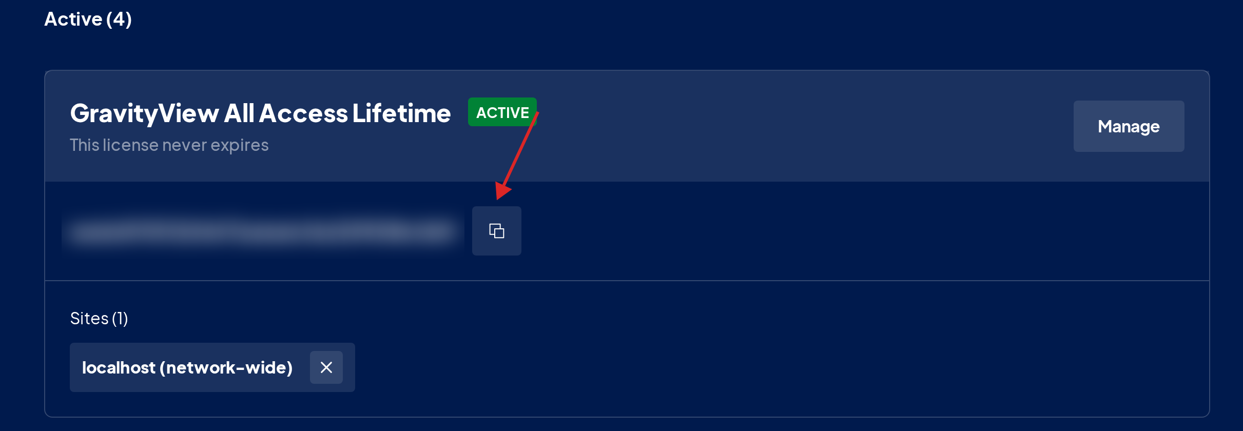License card in the GravityKit account with an arrow pointing at the copy license key button
