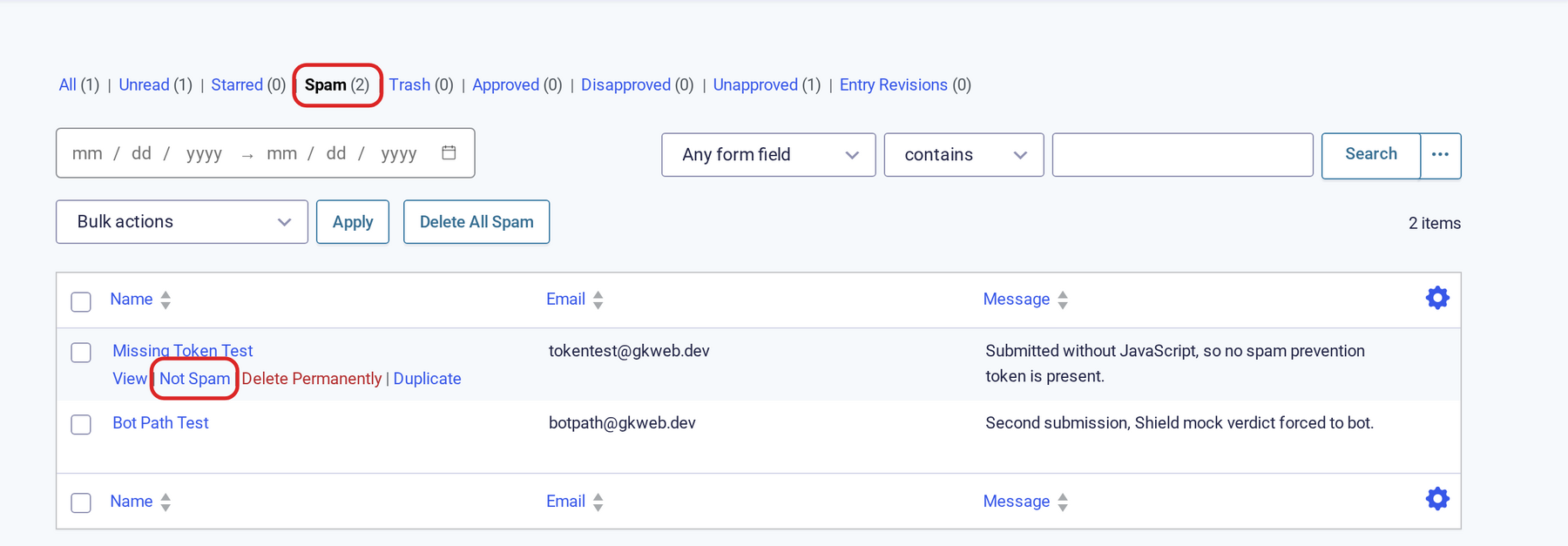 Spam view of the entries list showing a flagged test entry with the Spam filter and Not Spam action highlighted