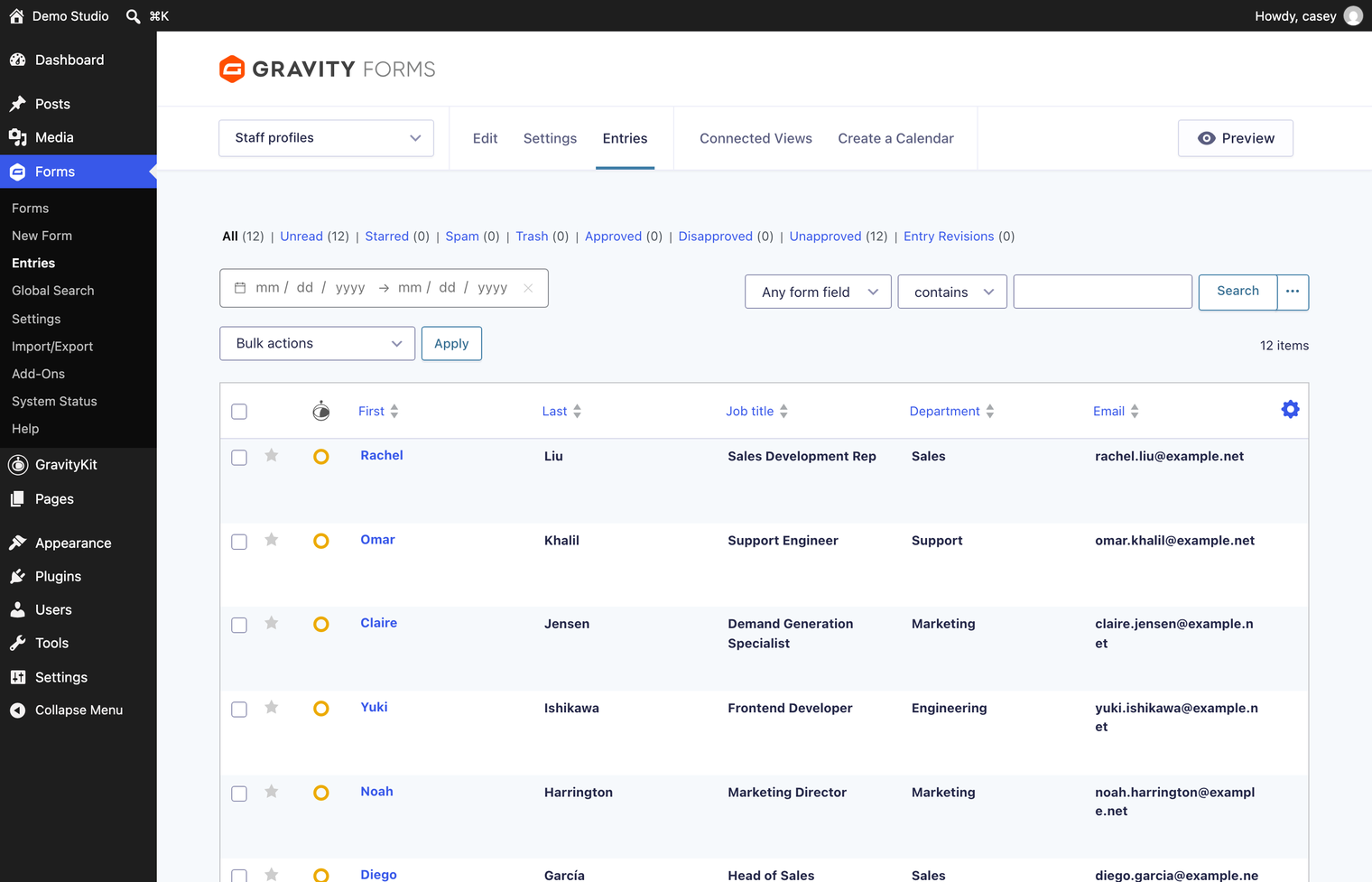 The Gravity Forms entries list for the Staff profiles form, showing twelve staff members with first name, last name, job title, department and email.